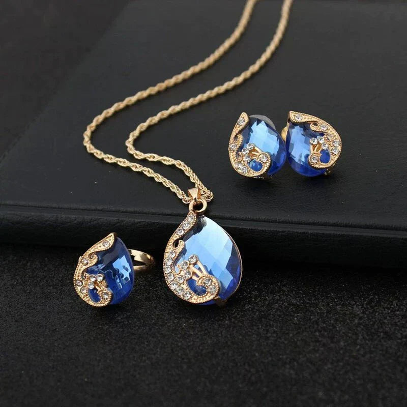 Set Collar + Aretes Colgantes de Cristal Azul en Oro