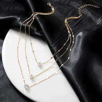 Collar de Tres Dijes con Zirconia en Oro