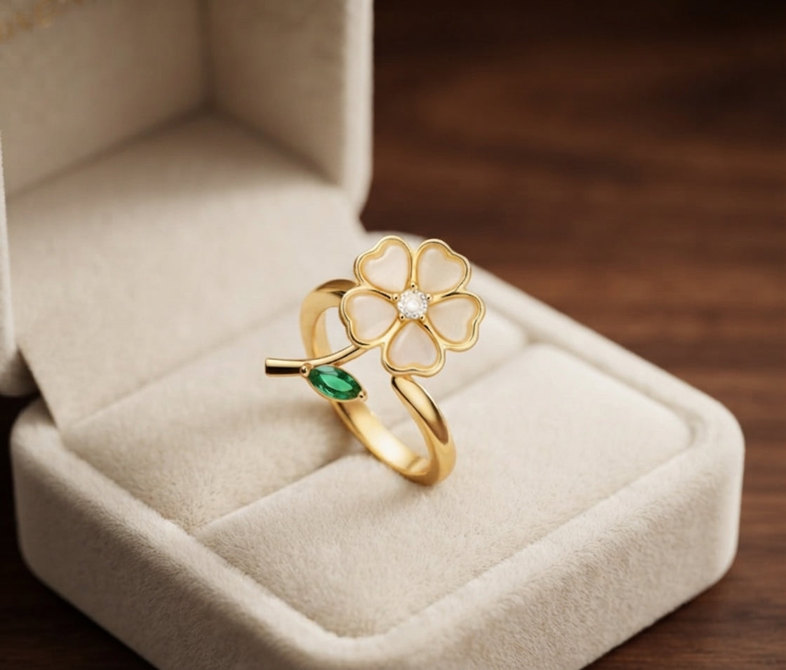 Anillo Giratorio de Flor y Hoja de Esmeralda