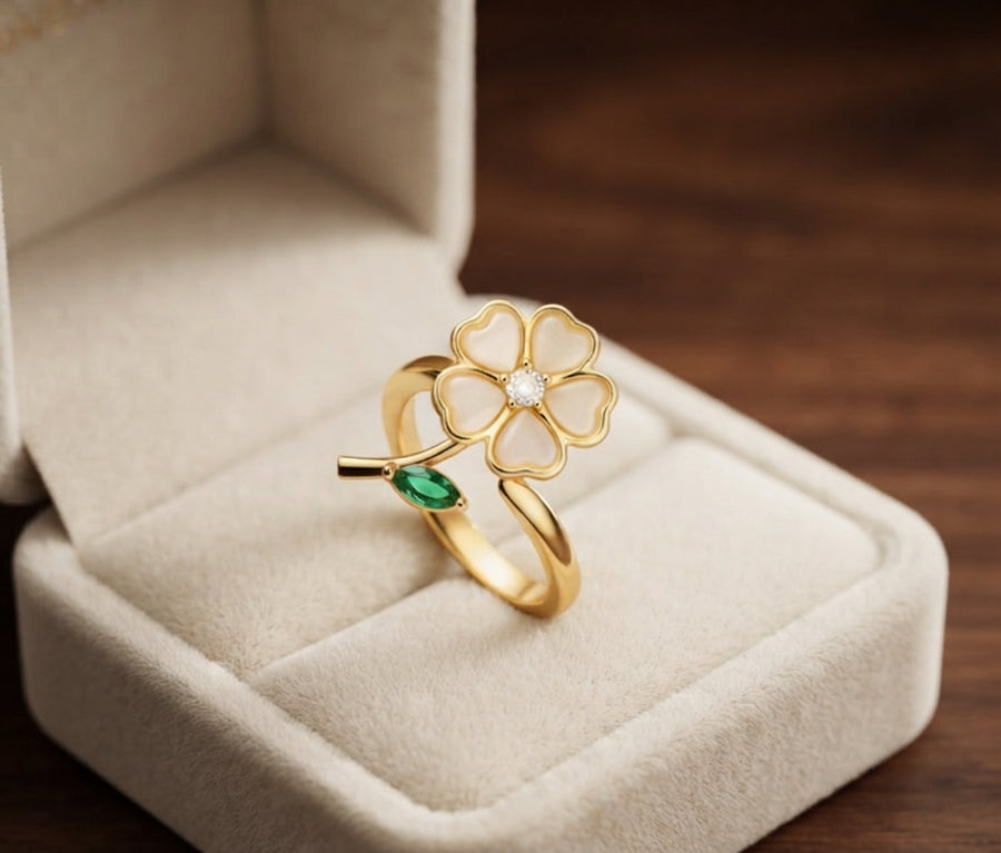Anillo Giratorio de Flor y Hoja de Esmeralda