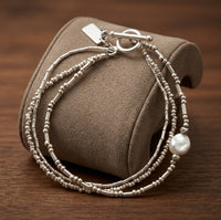 Set de Pulseras Vintage de Perla