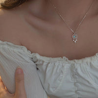 Collar Atrapasueños de Luna de Cristal en Plata