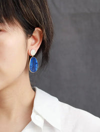 Aretes Colgantes Statement de Doble Círculo