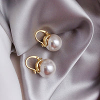 Aretes de Perla Gruesa en Oro