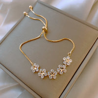 Pulsera de Margarita de Cristal en Oro