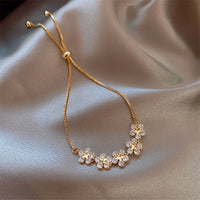 Pulsera de Margarita de Cristal en Oro