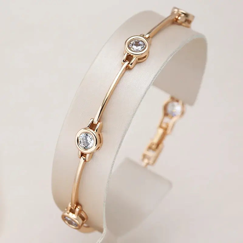 Pulsera elegante con zirconias en oro