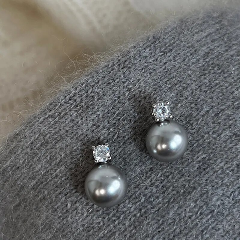 Aretes Elegantes de Perla Negra y Zirconia