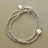 Set de Pulseras Vintage de Perla