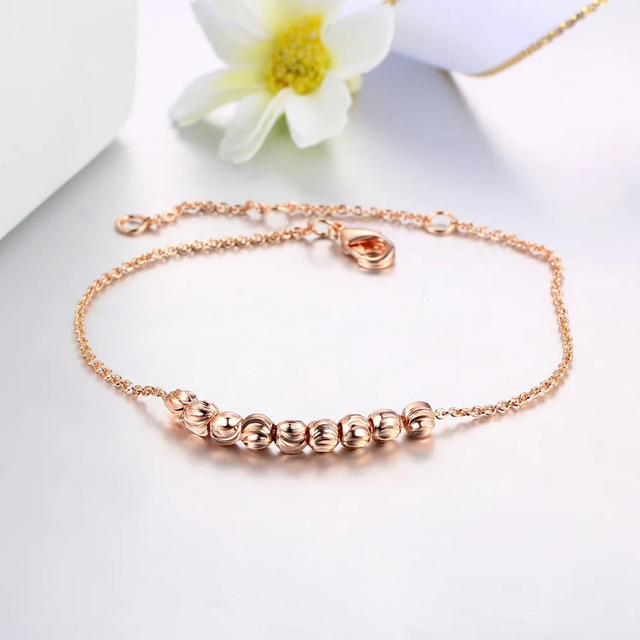 Pulsera Clásica de Cuentas Redondas Lisas en Oro Rosa