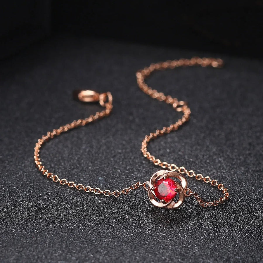 Pulsera de Dije de Flor de Cristal Rojo en Oro Rosa