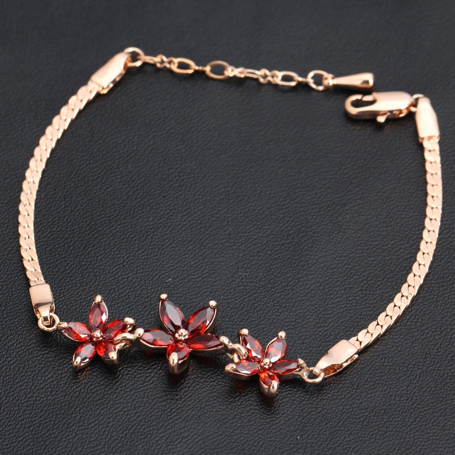 Pulsera Retro de Oro Rosa & Tres Flores de Cristal Rojo