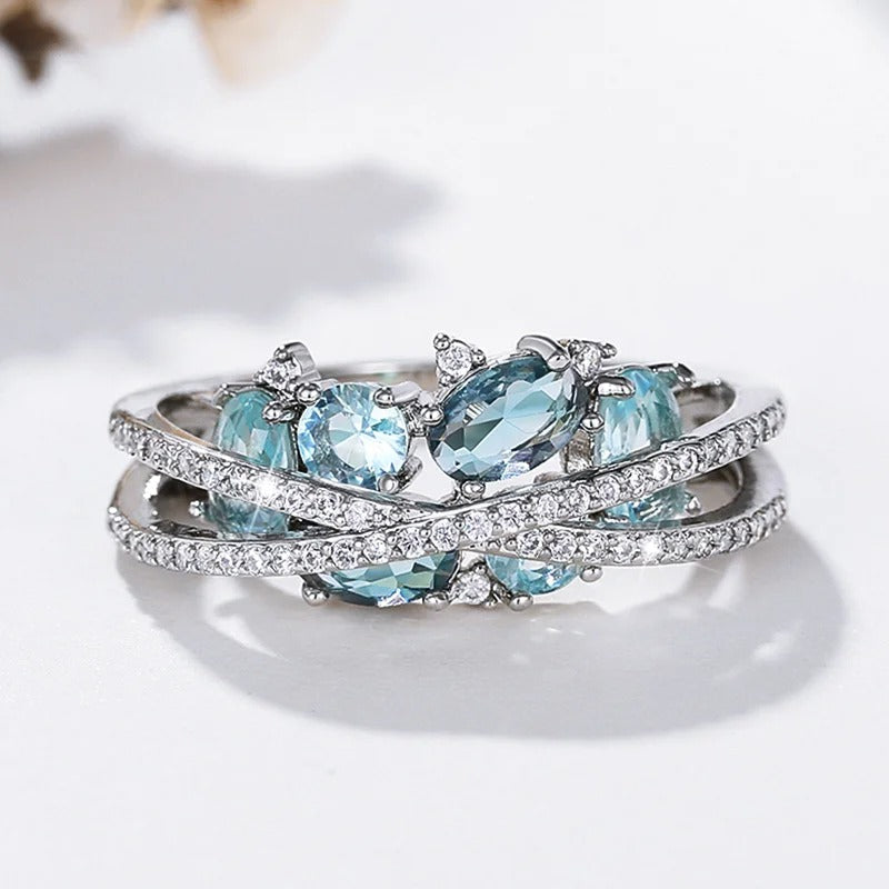 Anillo de Cruz con Piedra Preciosa Azul en Plata