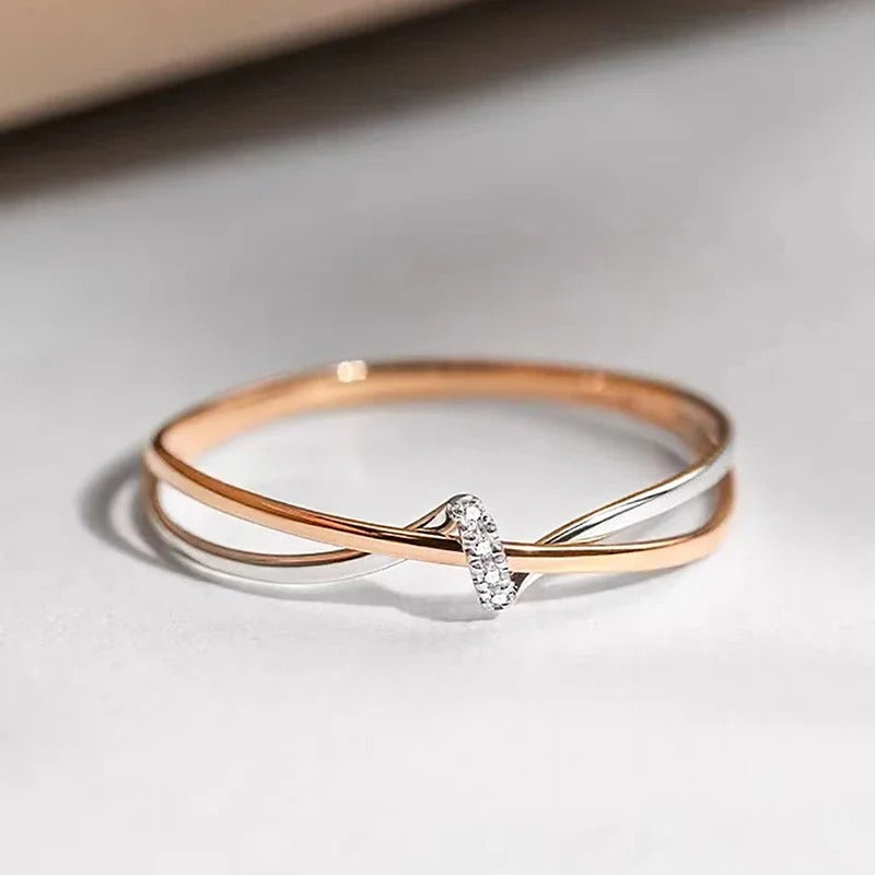 Anillo Cruzado en Oro Rosa y Plata