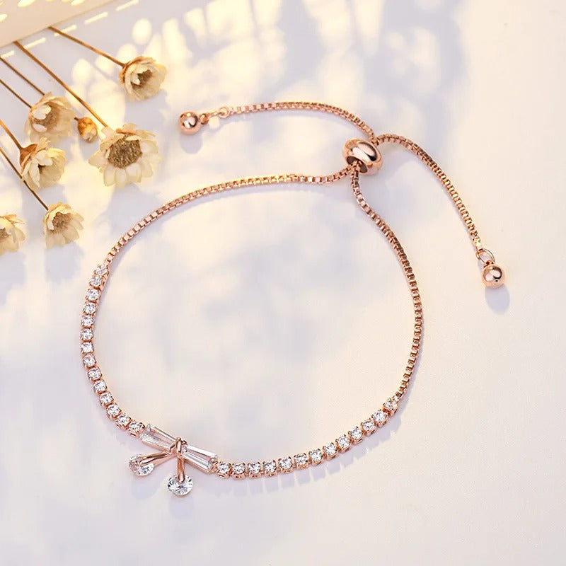 Pulsera Ajustable Clásica de Moño de Cristal en Oro Rosa